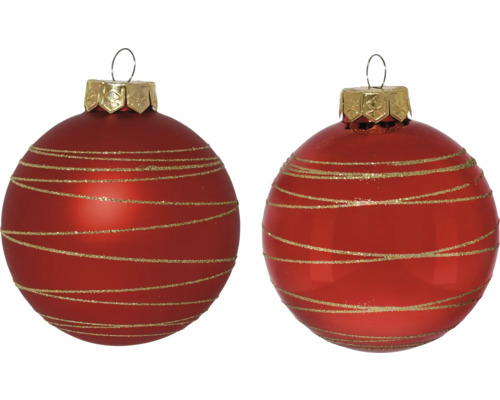 Deux boules de Noël rouges avec des rayures dorées