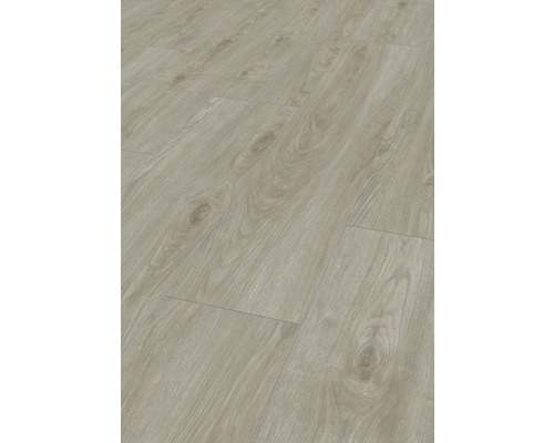 Gros plan d''un sol stratifié posé avec veinures de bois