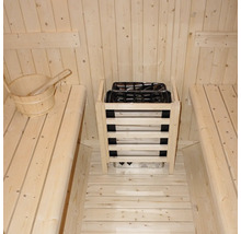 Intérieur de sauna avec bancs en bois et poêle de sauna