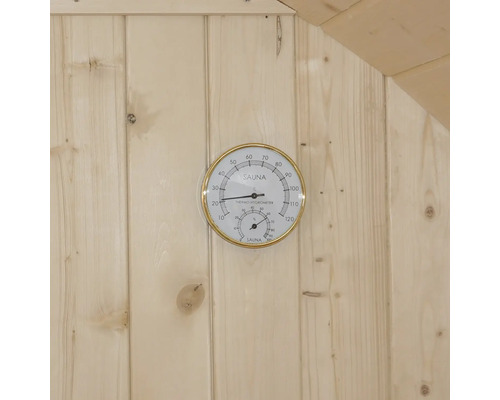 Thermomètre et hygromètre de sauna sur un mur en bois