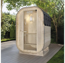 Sauna en bois avec porte en verre et carton bitumé dans le jardin.