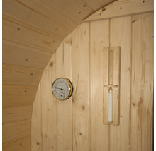 Intérieur de sauna avec thermomètre et sablier