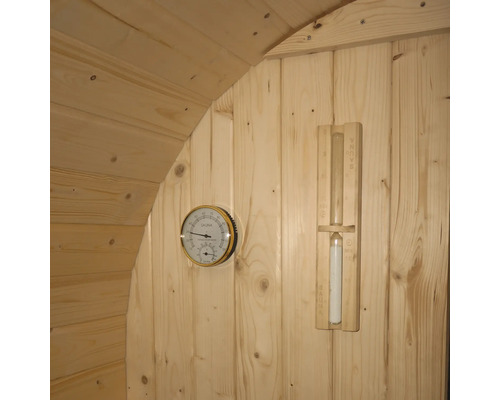 Intérieur de sauna avec thermomètre et sablier