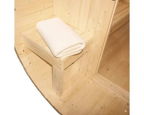 Sauna en bois avec banc et serviette