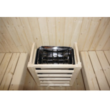 Poêle de sauna avec revêtement en bois dans un sauna