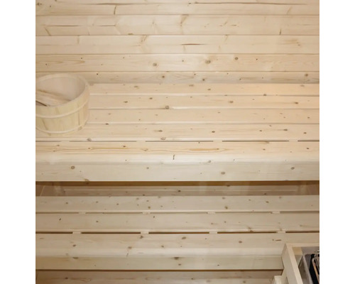 Sauna en bois avec seau et louche en bois
