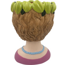 Pot de fleurs en forme de tête de femme avec couronne de fleurs
