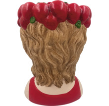 Figurine en céramique avec décoration de pomme, vue arrière