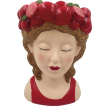 Pot de fleurs en forme de tête de fille avec couronne de cerises
