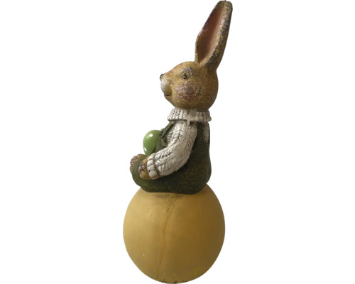 Osterhase Dekoration auf einer Kugel sitzend