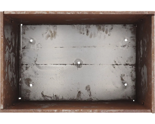 Vue intérieure d'un bac à plantes en métal avec trous pré-percés