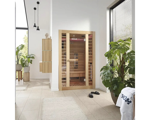 Salle de bains avec sauna infrarouge, ensemble de lavabo et plantes d'intérieur pour une atmosphère relaxante