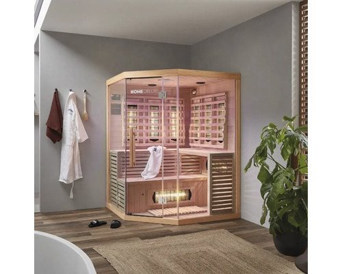 Sauna infrarouge d'angle Home Deluxe avec porte en verre et revêtement en bois dans la salle de bain