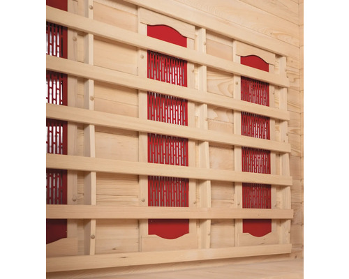 Vue intérieure d'un sauna avec revêtement en bois et radiateurs infrarouges