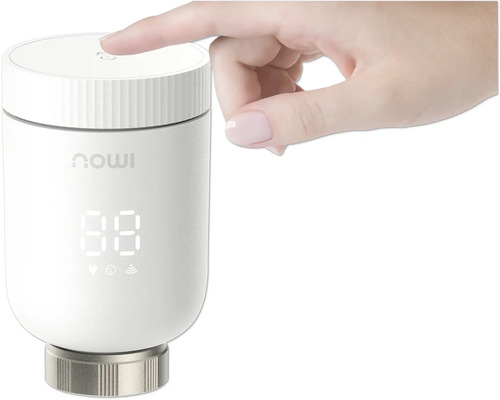 Main utilisant un thermostat de radiateur intelligent Imou avec affichage numérique.