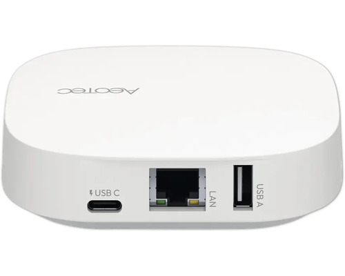 Hub Smart Home Aeotec blanc avec ports USB C, LAN et USB A et Aeotec Logo.