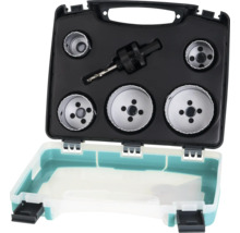 Scie-cloche avec foret dans une mallette à outils