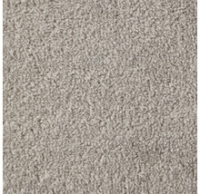 Gros plan d'un tapis gris à la texture dense