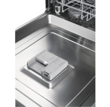 Intérieur d'un lave-vaisselle avec compartiment pour produit de nettoyage