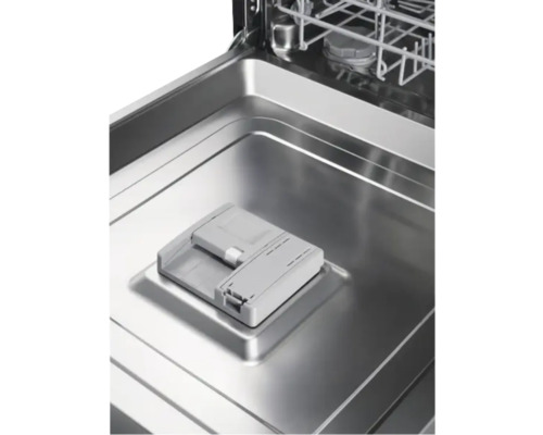 Intérieur d'un lave-vaisselle avec compartiment pour produit de nettoyage