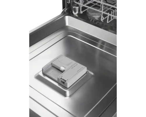 Intérieur d'un lave-vaisselle avec réservoir de détergent