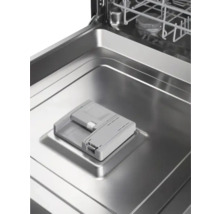 Intérieur d'un lave-vaisselle avec compartiment à détergent