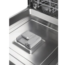 Intérieur d'un lave-vaisselle avec compartiment pour le produit de nettoyage