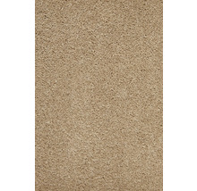 Gros plan d'un tapis beige à la texture dense