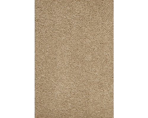 Gros plan d'un tapis beige à la texture dense
