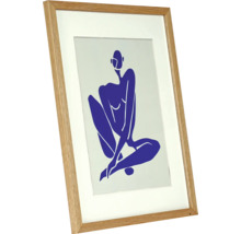 Affiche encadrée avec une représentation abstraite d'une personne assise