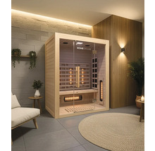 Vue intérieure d'un sauna Home Deluxe avec façade en verre, revêtement en bois et radiateurs infrarouges
