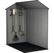 Abri de jardin avec outils de jardin tels que bêches, râteaux et fourches