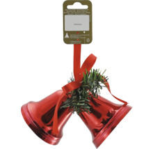 Décoration de Noël avec deux clochettes rouges, un ruban et des branches de sapin
