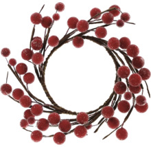 Couronne décorative avec des baies rouges pour les occasions festives
