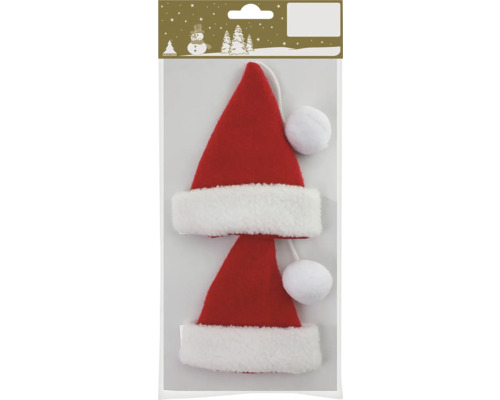 Deux bonnets de Père Noël rouges avec bordure blanche et pompon comme décoration de sapin de Noël