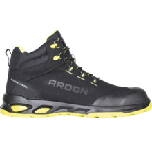 Chaussure de travail noire Ardon avec des accents jaunes.