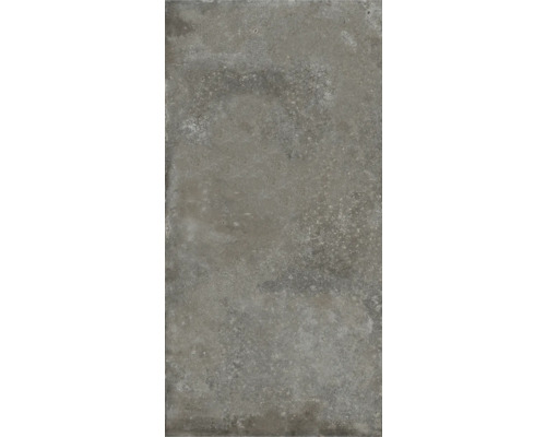 Carreau de sol gris aspect béton.