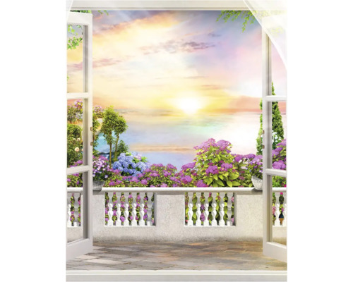 Papier peint photo représentant une porte ouverte donnant sur un balcon fleuri au coucher du soleil