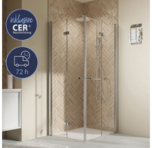 Eckdusche mit Glaswänden und Armaturen im Badezimmer