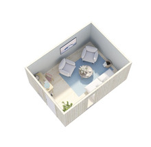 Vue intérieure d'une maison de jardin en bois avec des meubles, dont des fauteuils, un canapé, une table et de la décoration