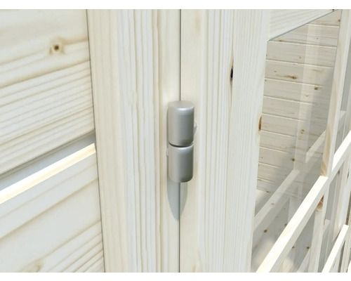 Vue détaillée d'une charnière de porte sur une porte en bois