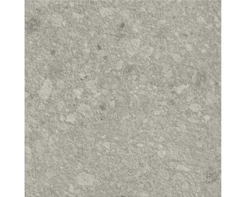 Gros plan d'un carreau de sol gris avec une texture mouchetée