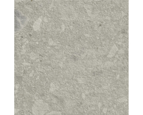 Gros plan d'un carreau de sol avec une structure en pierre