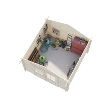 Vue intérieure d'un abri de jardin avec outils de jardinage, barbecue et outils