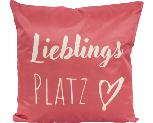 Kissen mit der Aufschrift Lieblingsplatz und einem Herz