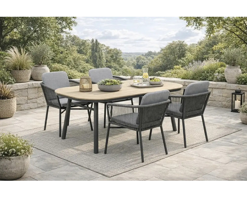Ensemble de mobilier de jardin avec table à manger et chaises sur une terrasse