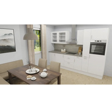 Cuisine claire avec table à manger et banquette