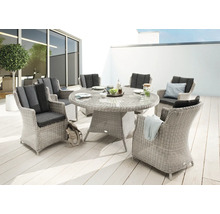 Ensemble de jardin rond avec table en rotin, six chaises et coussins d'assise gris sur terrasse