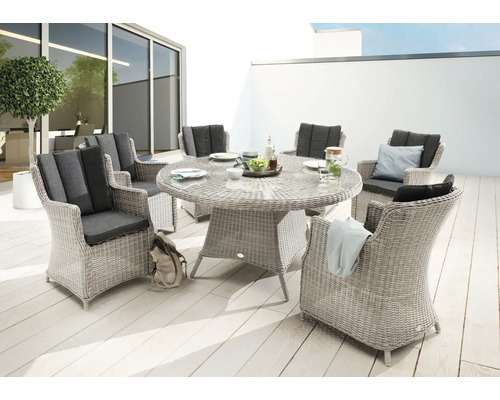 Ensemble de jardin rond avec table en rotin, six chaises et coussins d'assise gris sur terrasse