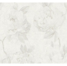 Papier peint intissé avec motif floral discret, grandes fleurs et feuilles en blanc et gris clair, surface structurée.
